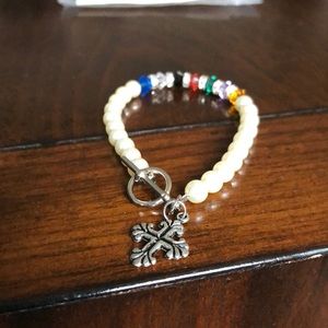 Jewel tones pearl like bracelet w/ cross charm
